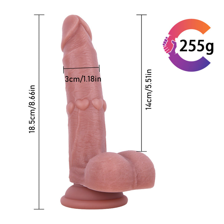 Strukturierter Umschnalldildo mit Herzmotiv