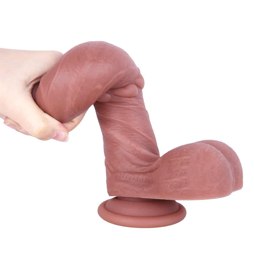 Strukturierter Umschnalldildo mit Herzmotiv