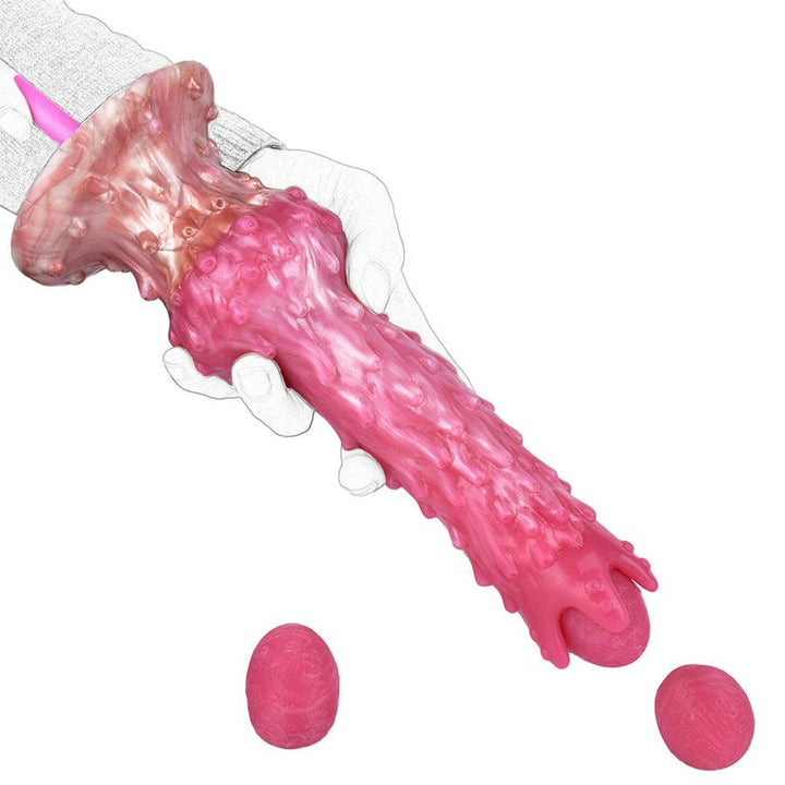 Pinker Alien-Dildo mit manuellem Ovulationsgerät