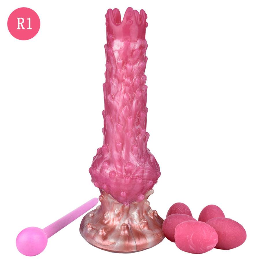 Pinker Alien-Dildo mit manuellem Ovulationsgerät