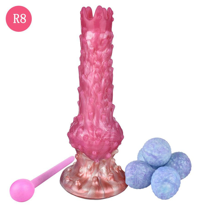 Pinker Alien-Dildo mit manuellem Ovulationsgerät